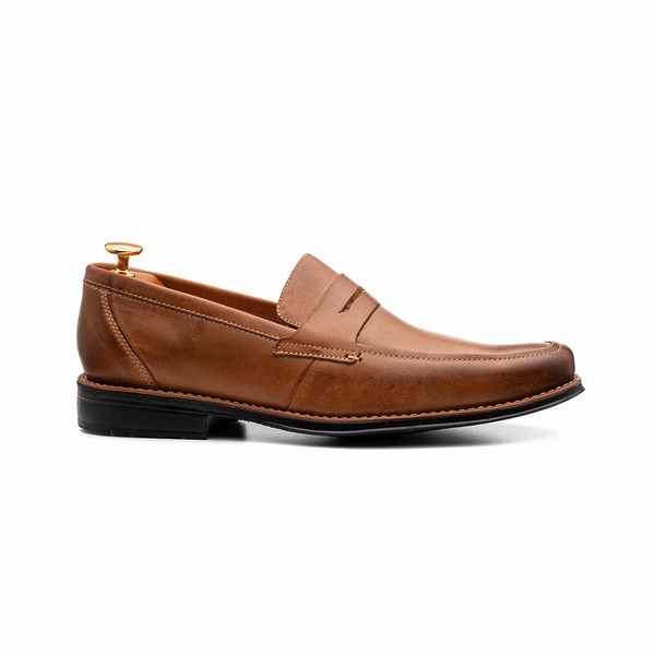 sandro moscoloni penny loafer shoe in tan color being shown in a gif that shows all its angles 